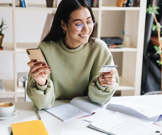 Woman holding a credit card